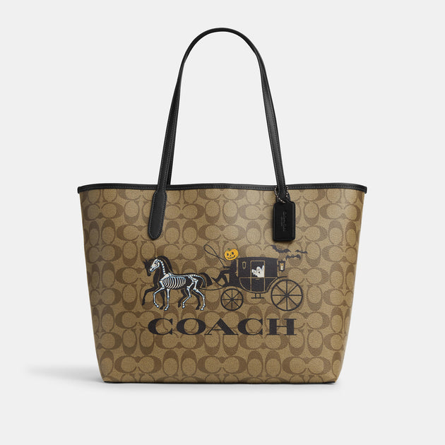COACH®  Corner Zip Wristlet In Signature Canvas With Halloween Horse And  Carriage