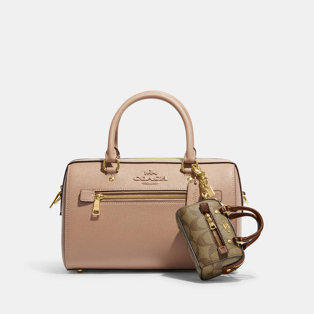 Coach mini rowan satchel bag charm in dandelion print . Poshmark purch
