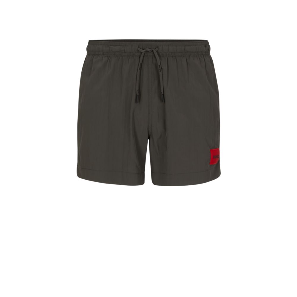Monogram-print swim shorts in quick-drying fabric