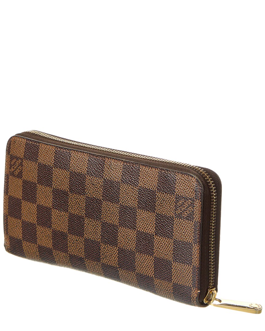 Louis Vuitton Damier Ebene Canvas Studded Zippy Wallet (authentic Pre-owned)  in Brown