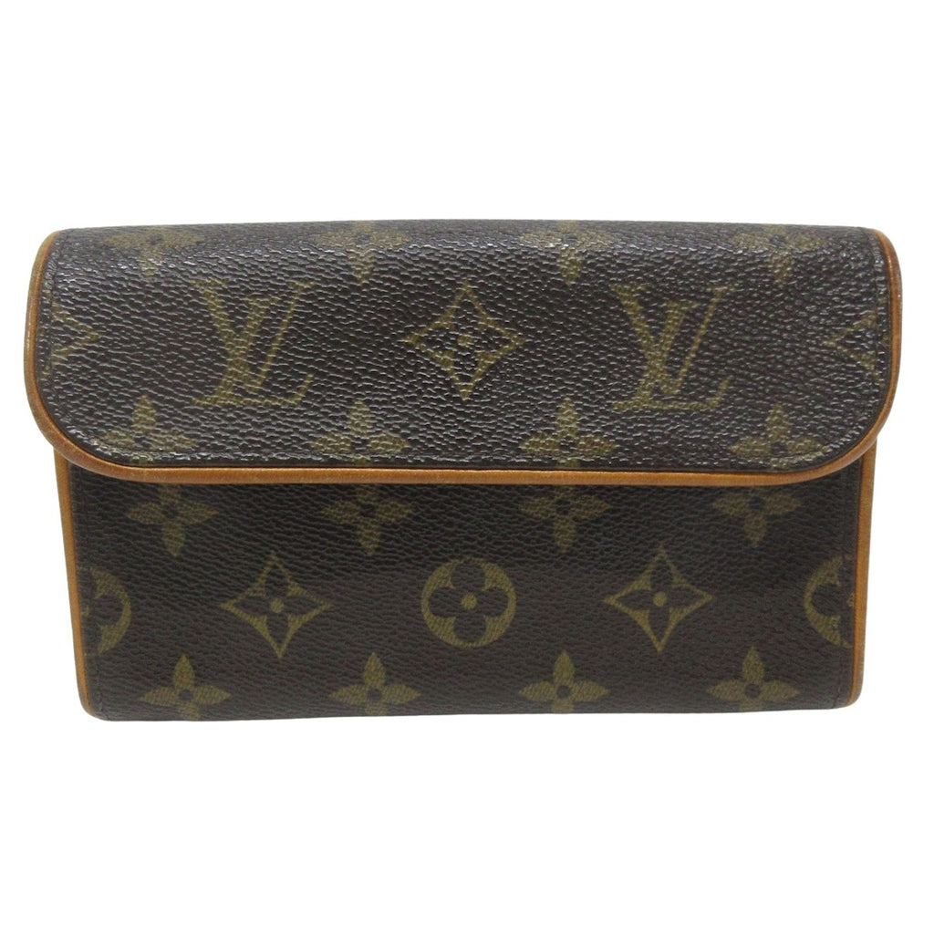 Louis Vuitton Tilsitt Leather Clutch Bag (pre-owned) in Brown