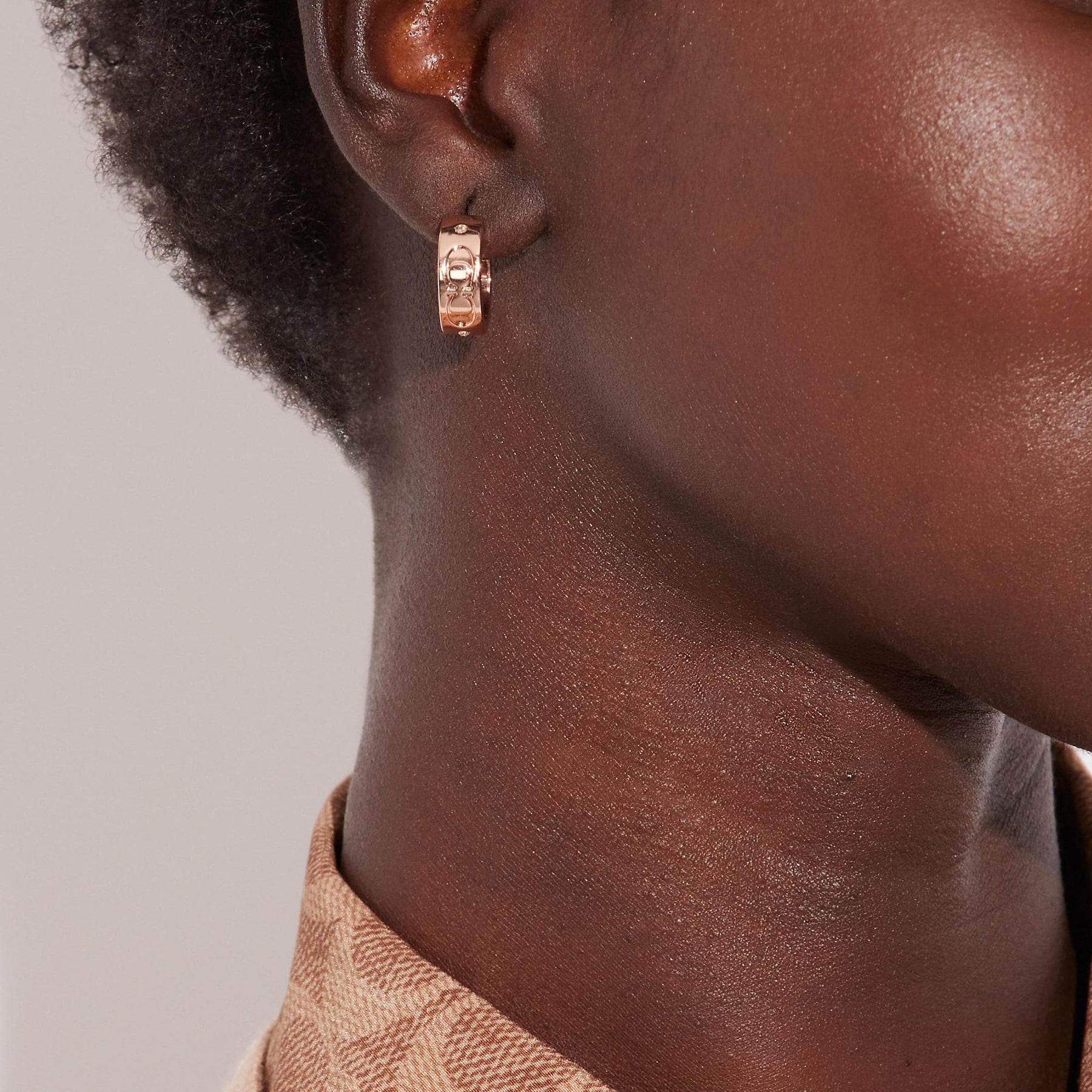 Coach signature huggie earrings Clearance